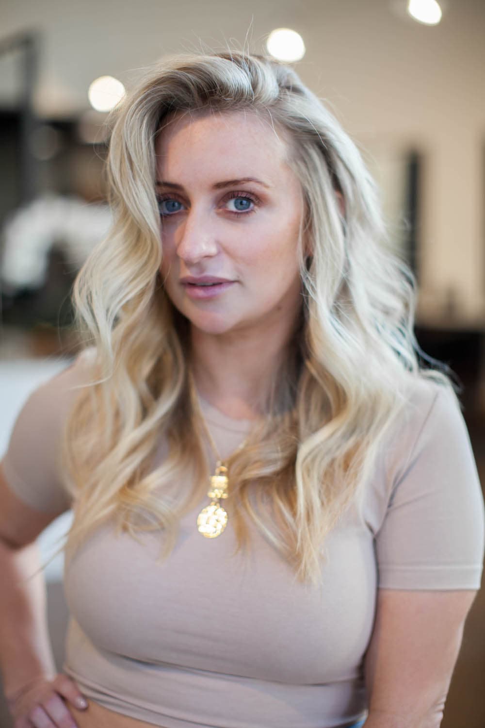 Smooth, frizz-free hair after a Pura Luxe treatment at Pursuit Salon