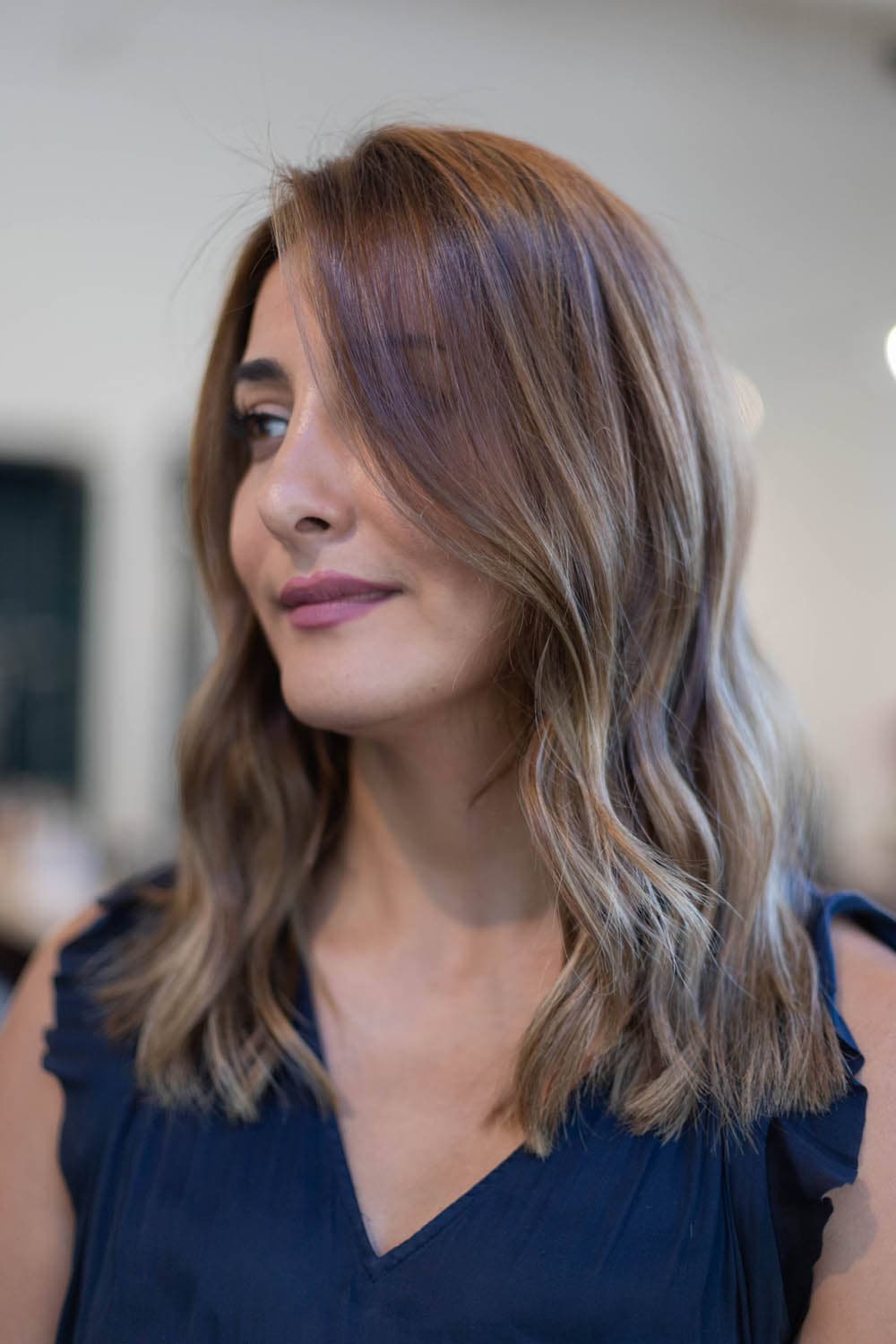 Dimensional brunette balayage in profile at Pursuit Salon in Los Altos