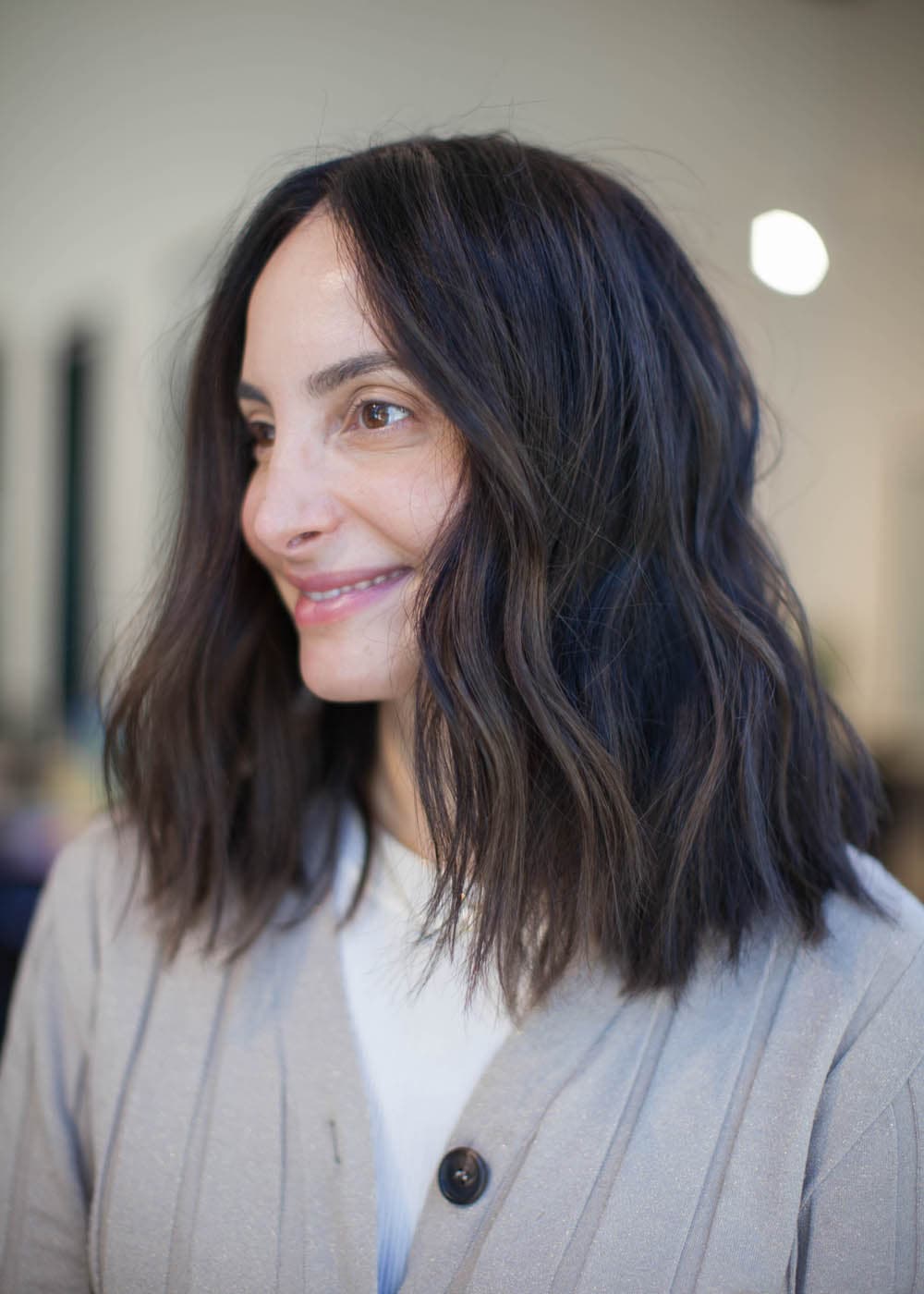 Textured dark brunette lob at Pursuit Salon in Los Altos